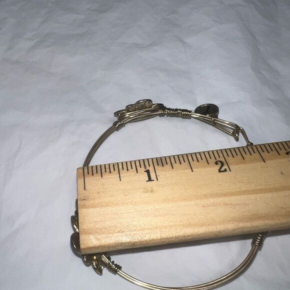 Gold Tone JM Collection Wire  Fleur-de-lis Hook and Loop Bangle Bracelet - Picture 6 of 6